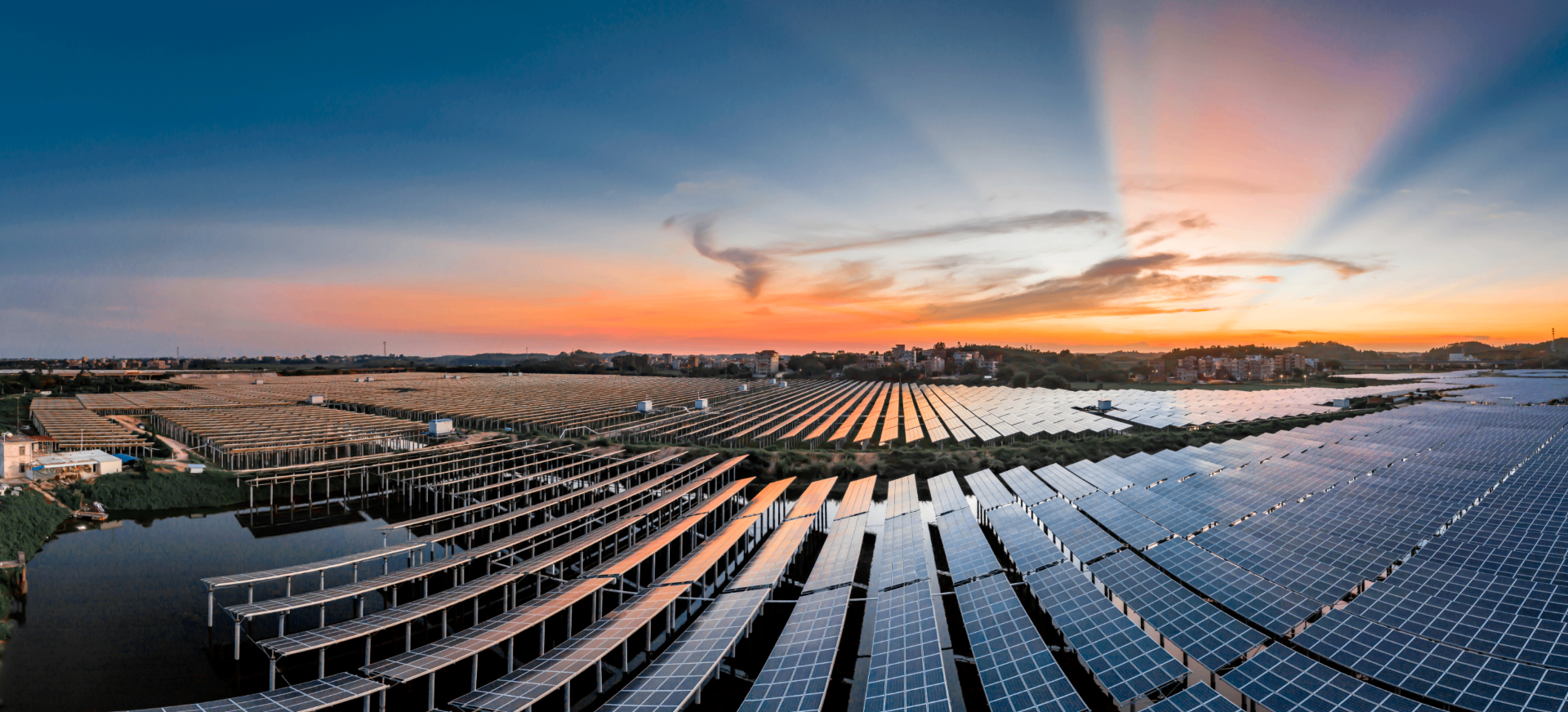Aerial solar farm at sunset