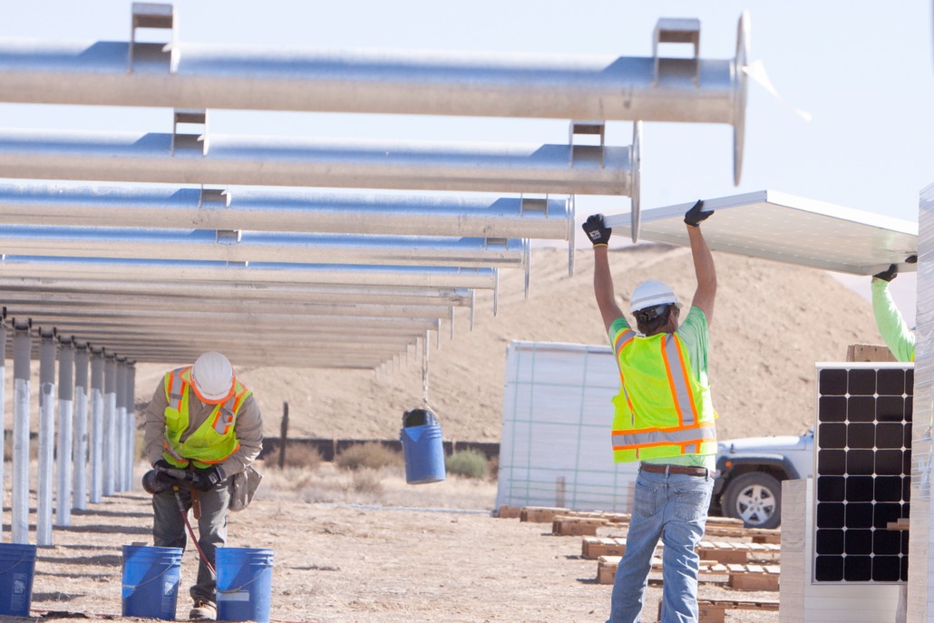 EPC construction crew installing solar panel
